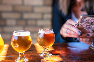 Close-up of beer glass on table