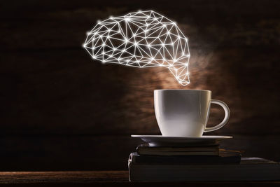 Close-up of coffee cup on table