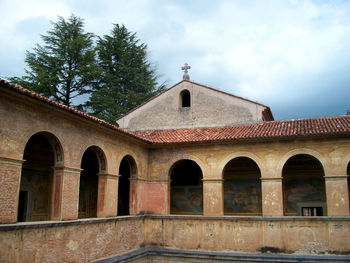 Low angle view of historic building against sky