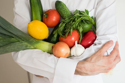 Close-up of hand holding fruits