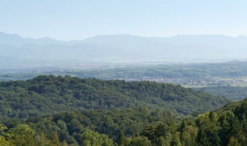 High angle view of trees and mountains against sky