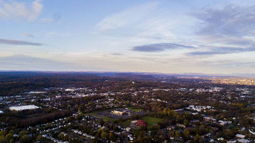 Aerial view of cityscape against sky