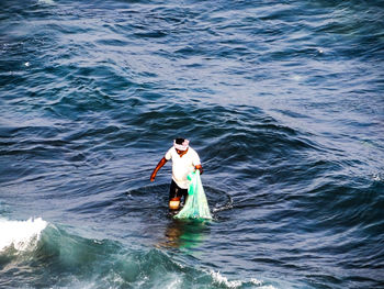 Man standing in sea