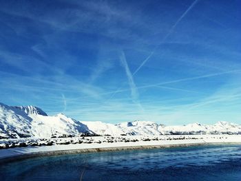 Scenic view of snow covered mountains