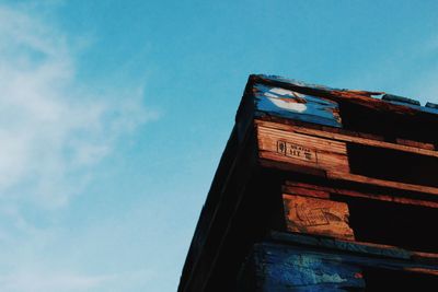 Low angle view of building against blue sky