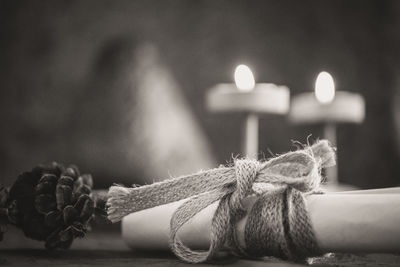 Close-up of rope tied on table