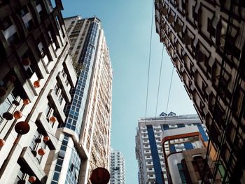 Low angle view of buildings against clear sky