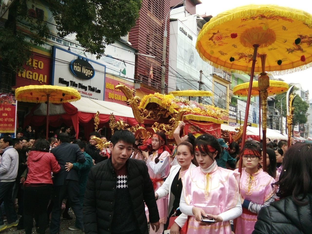 PEOPLE IN TRADITIONAL BUILDING