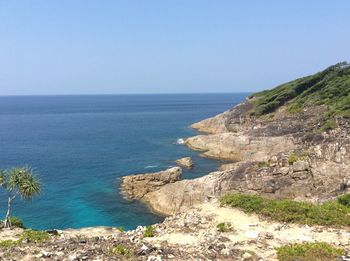 Scenic view of sea against blue sky