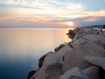 Scenic view of sea at sunset