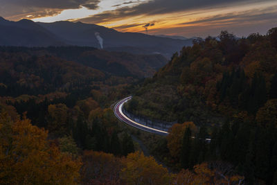 Scenic view of mountains against sky during sunset