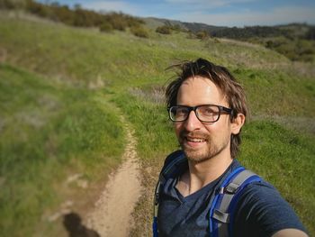 Portrait of smiling young man wearing hat