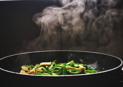 Close-up of vegetables in cooking pan