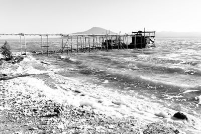 Scenic view of beach against clear sky