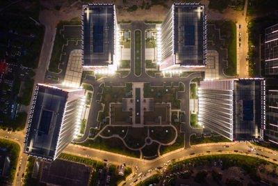 High angle view of illuminated buildings in city