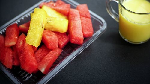 High angle view of fruits in tray on table