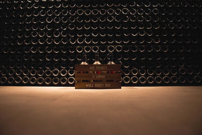 Full frame shot of beer bottles in building