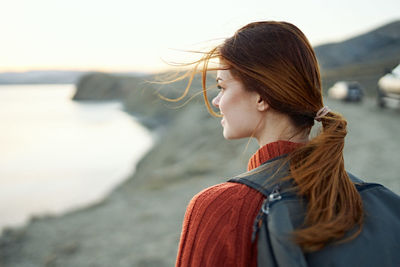 Woman standing at beach