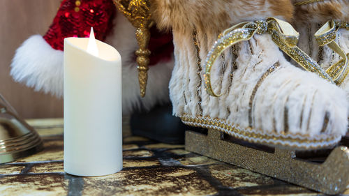 Close-up of cross on table