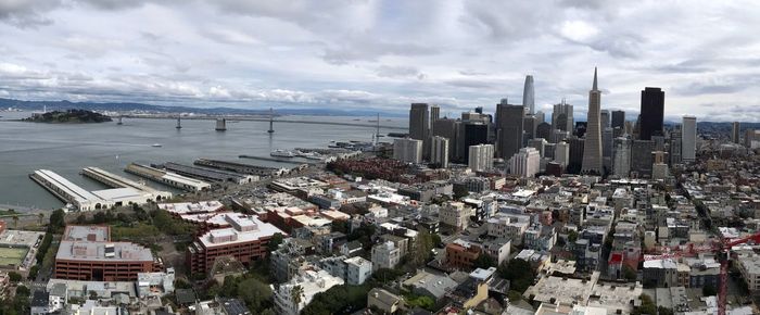 High angle view of buildings in city against sky