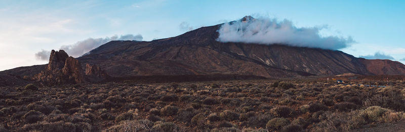 Panoramic view of volcanic landscape against sky