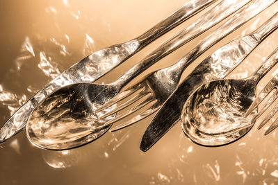 Fork, spoon and knife, isolated on white background