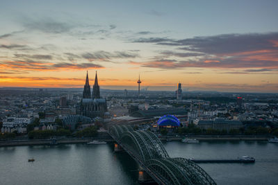 High angle view of city at sunset