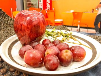 Close-up of fruits in plate on table