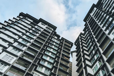 Low angle view of modern building against sky