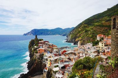 High angle view of town by sea