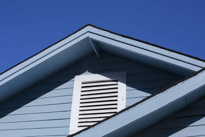 Awning and roof of a blue house