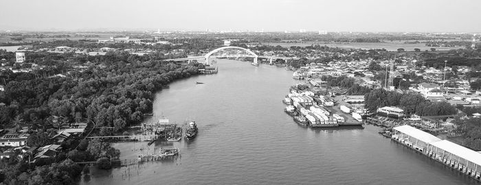 High angle view of bridge over river against buildings