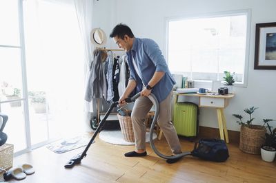 Side view of man working at home