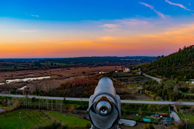 View of cityscape against sky during sunset