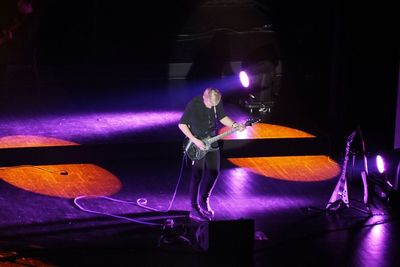 Man playing with light painting