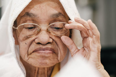 Close-up of senior woman with eyeglasses