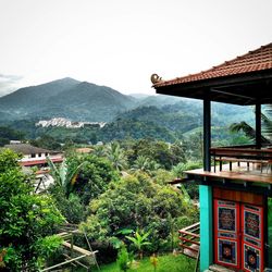 House against mountain range