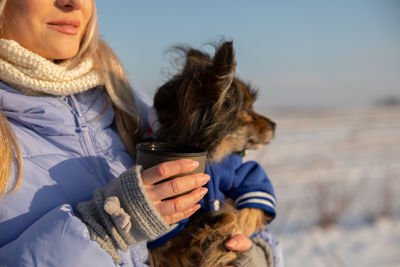 Portrait of woman with dog