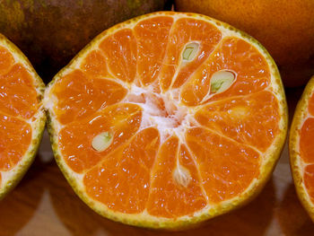 Close-up of orange slices on table