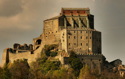 Low angle view of old ruin building against sky