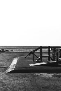 Scenic view of beach against clear sky