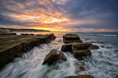 Scenic view of sea during sunset