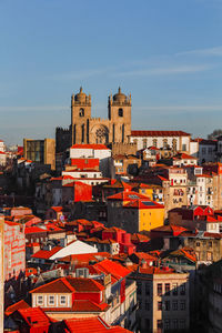 Aerial view of porto city buildings against sky with cathedral