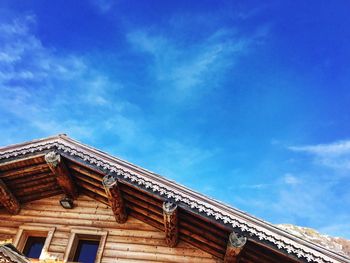 Low angle view of building against blue sky