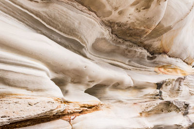 Rock formations on snow covered landscape