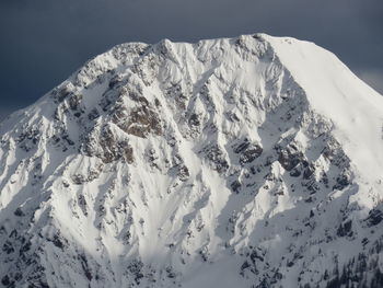 Scenic view of snow covered mountains