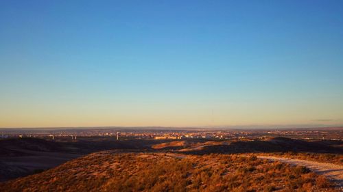 Scenic view of landscape against clear sky