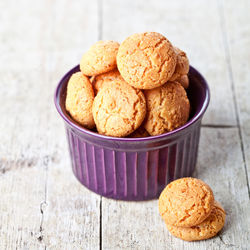 Close-up of cookies in container on table