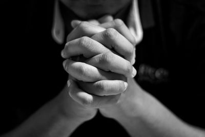 Depressed man is praying for hope and encouragement to continue living