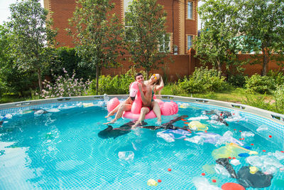 Woman swimming in pool